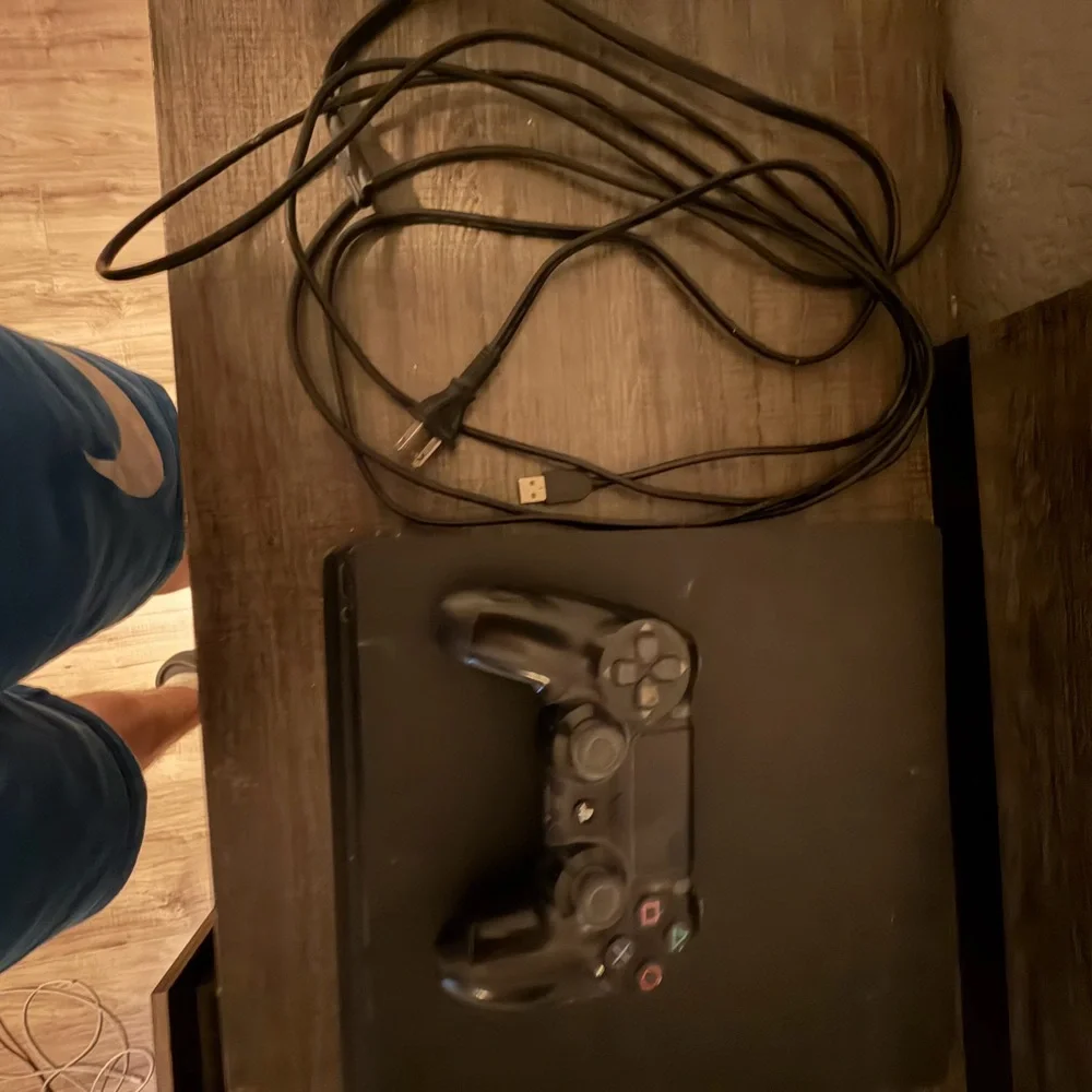 Sony Gaming Console with Black Controller